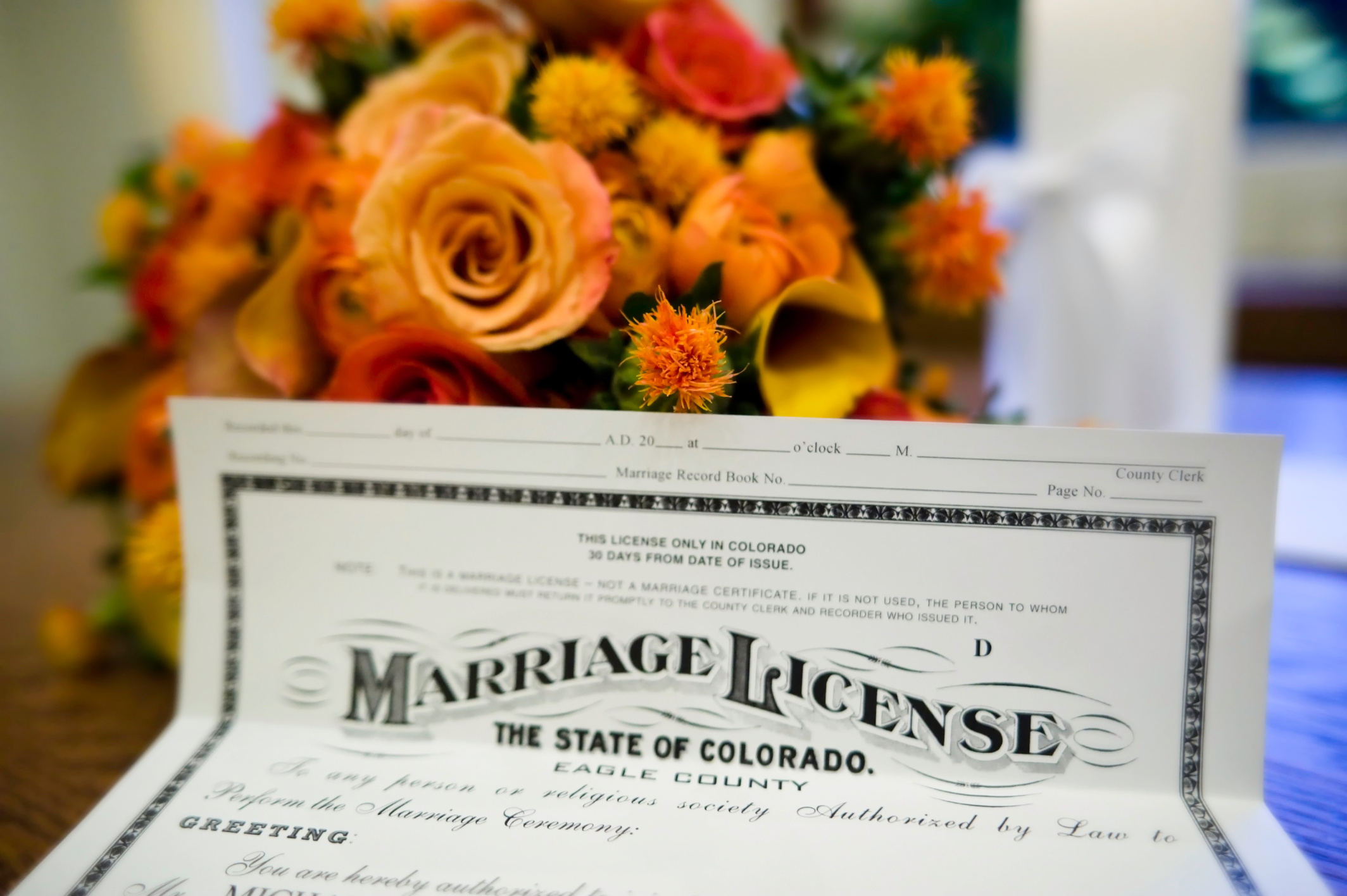 Marriage License Close Up Detail at Wedding with Flowers